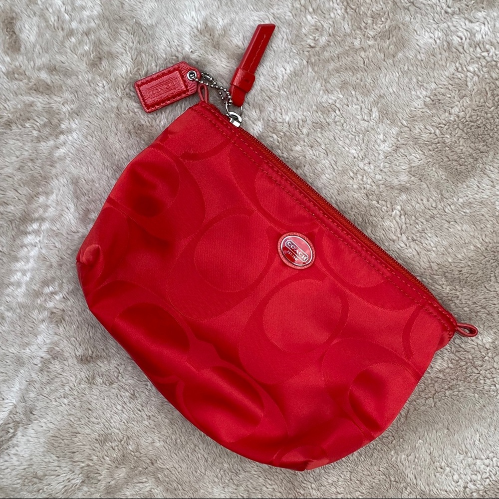 COACH orange pouch bag